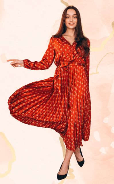 a woman in a red dress pointing