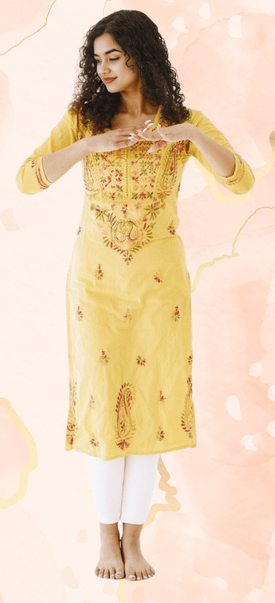 a woman in a yellow dress